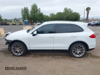 2014 Porsche Cayenne with VIN WP1AA2A27ELA09019, listed as a IAAI auction lot 42068012 with 77,997 mi miles and . Bid and sale history available at DreamBid. Image 15.