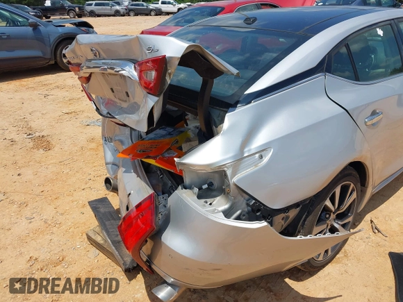 2016 Nissan Maxima SR with VIN 1N4AA6AP7GC389606, listed as a IAAI auction lot 42451614 with 114,957 mi miles and . Bid and sale history available at DreamBid. Image 6.