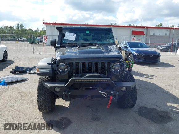 2023 Jeep Wrangler Rubicon with VIN 1C4HJXFGXPW534515, listed as a IAAI auction lot 41524419 with 21,376 mi miles and . Bid and sale history available at DreamBid. Image 12.
