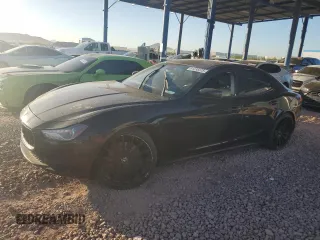 2015 Maserati Ghibli with VIN ZAM57XSA0F1141486, listed as a Copart auction lot 61236375 with 115,213 mi miles and Clean title. Bid and sale history available at DreamBid. Image 1.