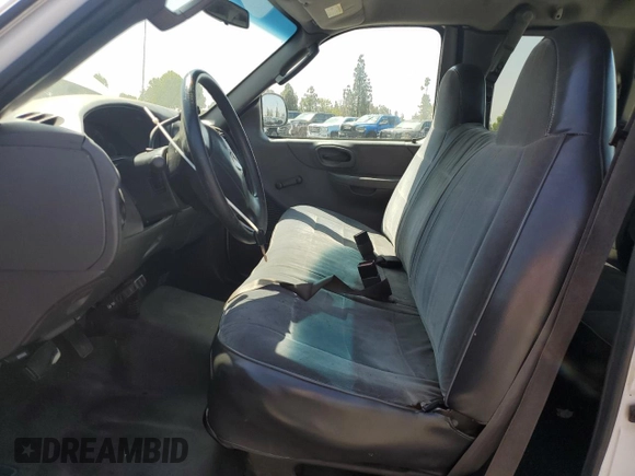 2003 Ford F-150 XL with VIN 1FTRX17W53NA54971, listed as a Copart auction lot 63686385 with 133,800 mi miles and Salvage title. Bid and sale history available at DreamBid. Image 7.