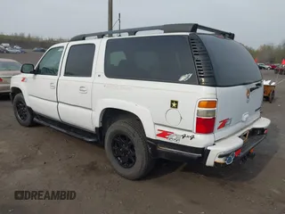 2004 Chevrolet Suburban Z71 with VIN 3GNFK16ZX4G103404, listed as a IAAI auction lot 42100161 with 321,012 mi miles. Bid and sale history available at carsss.com. Image 3.