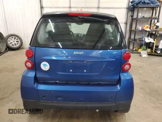 2009 Smart fortwo Pure z VIN WMEEJ31X99K209790, wystawiony jako Copart lot #51102685 z przebiegiem 30 389 mil mil oraz Szkody całkowita. Historia ofert i sprzedaży dostępna na DreamBid. Obrazek 10.