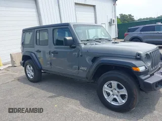 2020 Jeep Wrangler Unlimited Black and Tan with VIN 1C4HJXDG3LW298223, listed as a IAAI auction lot 42446032 with 17,688 mi miles and . Bid and sale history available at DreamBid. Image 13.