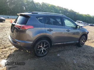 2018 Toyota RAV4 SE with VIN JTMNFREV6JJ157671, listed as a Copart auction lot 55476875 with 93,749 mi miles and Salvage title. Bid and sale history available at DreamBid. Image 3.