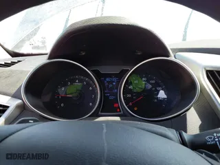 2015 Hyundai Veloster RE:FLEX with VIN KMHTC6AD1FU232984, listed as a IAAI auction lot 41570593 with 180,435 mi miles. Bid and sale history available at carsss.com. Image 7.