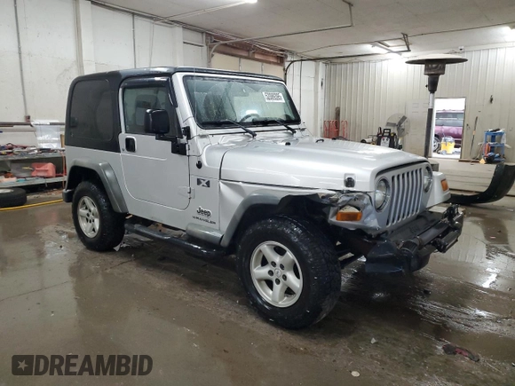 2003 Jeep Wrangler X with VIN 1J4FA39S43P350248, listed as a Copart auction lot 52089395 with 162,524 mi miles and Salvage Title. Bid and sale history available at carsss.com. Image 4.