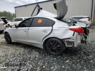 2014 Infiniti Q50 Premium with VIN JN1BV7ARXEM691878, listed as a Copart auction lot 56767475 with 151,257 mi miles and Clean title. Bid and sale history available at DreamBid. Image 2.