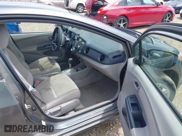 2010 Honda Insight EX with VIN JHMZE2H71AS008487, listed as a IAAI auction lot 42533409 with 95,765 mi miles and . Bid and sale history available at DreamBid. Image 5.