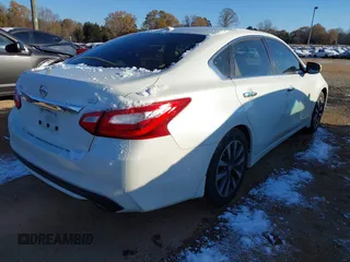 2016 Nissan Altima SV with VIN 1N4AL3AP1GC191838, listed as a IAAI auction lot 40991495 with 206,581 mi miles and . Bid and sale history available at DreamBid. Image 4.