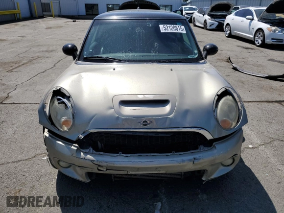 2009 MINI Hardtop S with VIN WMWMF73549TT94143, listed as a Copart auction lot 52120615 with 144,334 mi miles and Salvage Title. Bid and sale history available at DreamBid. Image 5.
