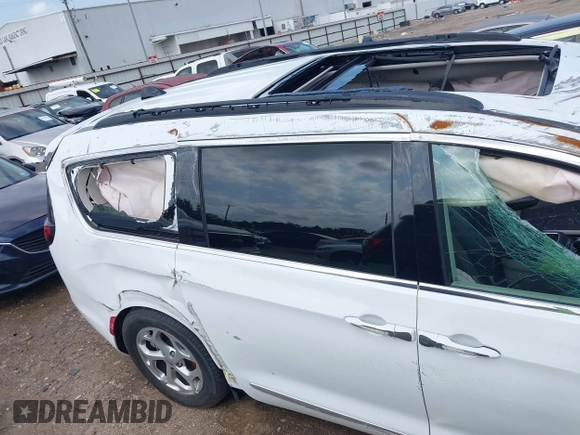 2023 Chrysler Pacifica Limited with VIN 2C4RC1GG4PR619997, listed as a IAAI auction lot 42421682 with 51,520 mi miles and . Bid and sale history available at DreamBid. Image 11.