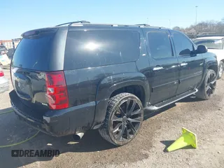 2011 Chevrolet Suburban LT with VIN 1GNSCJE06BR293634, listed as a IAAI auction lot 41742616 with 204,222 mi miles. Bid and sale history available at carsss.com. Image 4.