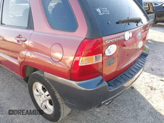 2005 Kia Sportage LX with VIN KNDJF723457078461, listed as a IAAI auction lot 41948080 with 104,330 mi miles and . Bid and sale history available at carsss.com. Image 16.