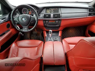 2014 BMW X6 M with VIN 5YMGZ0C56E0C40490, listed as a Copart auction lot 85317174 with 104,630 mi miles and Salvage Title. Bid and sale history available at carsss.com. Image 8.