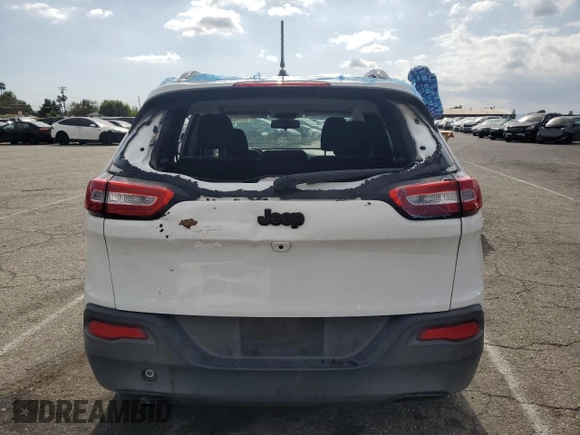 2016 Jeep Cherokee Sport with VIN 1C4PJLAB9GW312211, listed as a Copart auction lot 54890495 with 113,192 mi miles and Salvage Title. Bid and sale history available at carsss.com. Image 6.