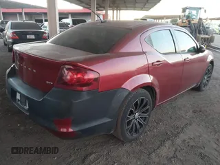 2014 Dodge Avenger SXT z VIN 1C3CDZCB3EN202882, wystawiony jako IAAI lot #41014567 z przebiegiem 152 793 mil mil oraz . Historia ofert i sprzedaży dostępna na DreamBid. Obrazek 4.