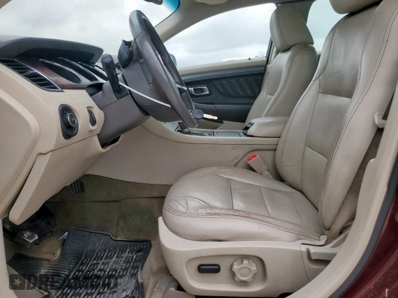 2011 Ford Taurus SEL z VIN 1FAHP2EW6BG183640, wystawiony jako Copart lot #54662745 z przebiegiem 149 309 mil mil oraz Szkoda całkowita • Salvage title. Historia ofert i sprzedaży dostępna na DreamBid. Obrazek 7.