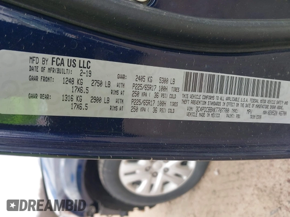 2019 Dodge Journey SE with VIN 3C4PDCBBXKT707700, listed as a IAAI auction lot 42038474 with 57,903 mi miles and . Bid and sale history available at DreamBid. Image 9.
