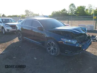 2016 Ford Taurus SHO z VIN 1FAHP2KT4GG140142, wystawiony jako IAAI lot #42332708 z przebiegiem 104 670 mil mil oraz . Historia ofert i sprzedaży dostępna na DreamBid. Obrazek 1.
