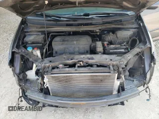 2014 Honda Odyssey EX-L with VIN 5FNRL5H60EB125478, listed as a Copart auction lot 59218355 with 165,928 mi miles and Salvage title. Bid and sale history available at DreamBid. Image 12.