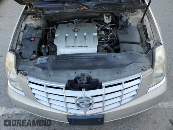 2007 Cadillac DTS V8 z VIN 1G6KD57Y77U125427, wystawiony jako Copart lot #82278094 z przebiegiem 117 812 mil mil oraz Czysty tytuł • Clean title. Historia ofert i sprzedaży dostępna na DreamBid. Obrazek 11.