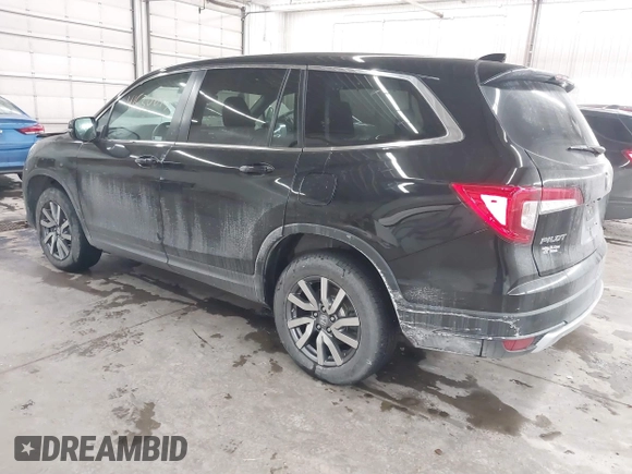 2021 Honda Pilot EX-L with VIN 5FNYF6H50MB092898, listed as a IAAI auction lot 41530673 with 28,505 mi miles. Bid and sale history available at carsss.com. Image 3.