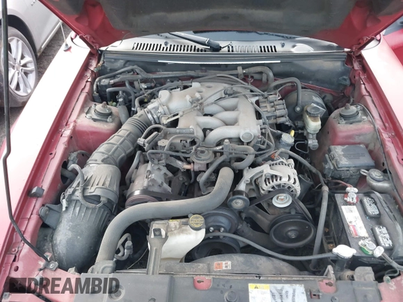2004 Ford Mustang Deluxe with VIN 1FAFP44604F212319, listed as a IAAI auction lot 42100591 with 191,992 mi miles. Bid and sale history available at carsss.com. Image 9.