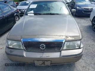 2003 Mercury Grand Marquis LS Premium z VIN 2MEFM75WX3X683205, wystawiony jako IAAI lot #42177139 z przebiegiem 200 521 mil mil oraz . Historia ofert i sprzedaży dostępna na DreamBid. Obrazek 12.