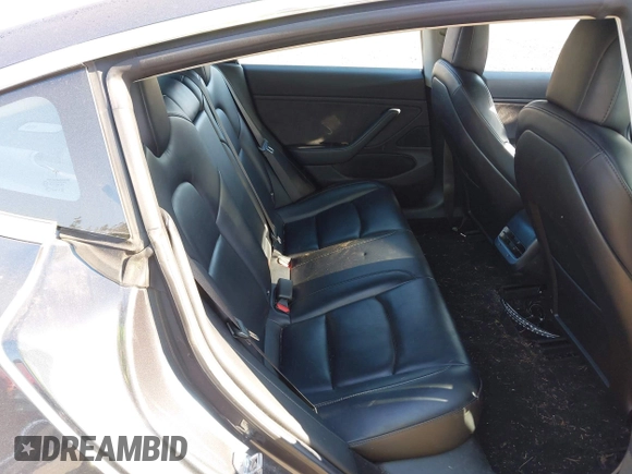 2018 Tesla Model 3 Long Range Battery with VIN 5YJ3E1EA1JF021139, listed as a IAAI auction lot 42116626 with 83,003 mi miles and . Bid and sale history available at DreamBid. Image 8.