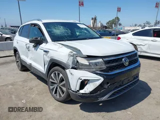 2022 Volkswagen Taos SE z VIN 3VVRX7B22NM074620, wystawiony jako IAAI lot #40242786 z przebiegiem 37 028 mil mil oraz . Historia ofert i sprzedaży dostępna na DreamBid. Obrazek 1.