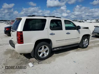 2012 Chevrolet Tahoe LTZ with VIN 1GNSCCE08CR214560, listed as a Copart auction lot 44723175 with 137,489 mi miles and Salvage title. Bid and sale history available at DreamBid. Image 3.