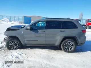 2021 Jeep Grand Cherokee Trailhawk with VIN 1C4RJFLG2MC854007, listed as a IAAI auction lot 41512394 with 50,674 mi miles. Bid and sale history available at carsss.com. Image 15.