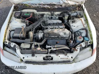 1994 Honda Civic z VIN 2HGEH2462RH505198, wystawiony jako Copart lot #42064495 z przebiegiem 327 318 mil mil oraz Czysty tytuł • Clean title. Historia ofert i sprzedaży dostępna na DreamBid. Obrazek 11.