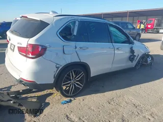 2016 BMW X5 sDrive35i with VIN 5UXKR2C52G0R69101, listed as a IAAI auction lot 41807519 with 1 mi miles. Bid and sale history available at carsss.com. Image 4.