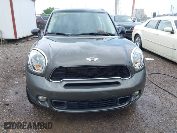 2011 MINI Countryman S with VIN WMWZC5C53BWM11022, listed as a IAAI auction lot 42249403 with 173,718 mi miles and . Bid and sale history available at DreamBid. Image 12.