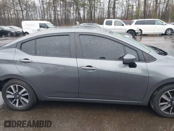 2021 Nissan Versa SV with VIN 3N1CN8EV9ML891855, listed as a IAAI auction lot 42010696 with 69,935 mi miles. Bid and sale history available at carsss.com. Image 12.