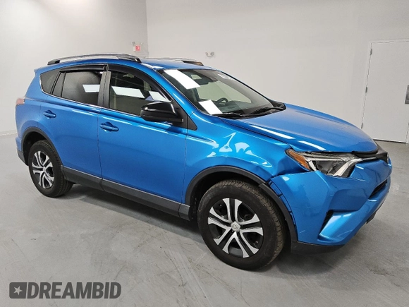 2018 Toyota RAV4 LE with VIN JTMBFREV5JD256838, listed as a Copart auction lot 48134385 with 59,831 mi miles and Clean Title. Bid and sale history available at DreamBid. Image 4.
