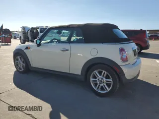 2014 MINI Convertible z VIN WMWZN3C5XET569992, wystawiony jako Copart lot #81044304 z przebiegiem 132 967 mil mil oraz Czysty tytuł • Clean title. Historia ofert i sprzedaży dostępna na DreamBid. Obrazek 2.