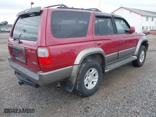1999 Toyota 4Runner Limited with VIN JT3HN87RXX0228366, listed as a IAAI auction lot 41951213 with 353,938 mi miles. Bid and sale history available at carsss.com. Image 4.