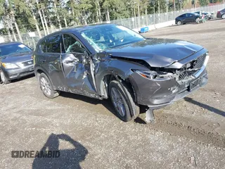 2019 Mazda CX-5 Grand Touring with VIN JM3KFBDM3K1677208, listed as a IAAI auction lot 41929299 with 58,163 mi miles. Bid and sale history available at carsss.com. Image 1.