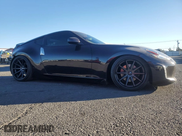 2015 Nissan 370Z Sport with VIN JN1AZ4EH7FM440155, listed as a Copart auction lot 86846404 with 82,330 mi miles and Salvage Title. Bid and sale history available at carsss.com. Image 4.