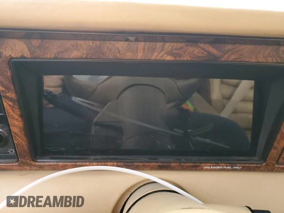 1987 Chrysler LeBaron z VIN 1C3CJ51E1HG137845, wystawiony jako Copart lot #86610254 z przebiegiem Nie podano mil oraz Czysty tytuł • Clean title. Historia ofert i sprzedaży dostępna na DreamBid. Obrazek 9.