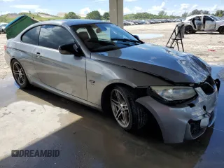 2011 BMW 3 Series 335is with VIN WBAKG1C52BE617713, listed as a Copart auction lot 74064204 with 132,742 mi miles and Salvage Title. Bid and sale history available at carsss.com. Image 4.