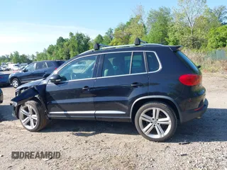 2014 Volkswagen Tiguan S z VIN WVGBV3AX5EW560393, wystawiony jako IAAI lot #42105203 z przebiegiem 102 001 mil mil oraz . Historia ofert i sprzedaży dostępna na DreamBid. Obrazek 15.