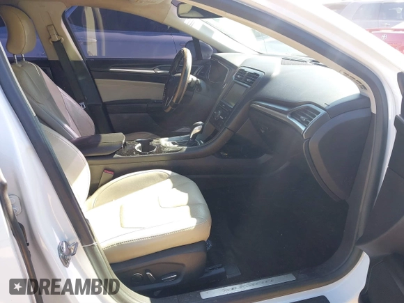 2016 Ford Fusion Titanium with VIN 3FA6P0K95GR180108, listed as a IAAI auction lot 41763917 with 163,331 mi miles and . Bid and sale history available at carsss.com. Image 5.