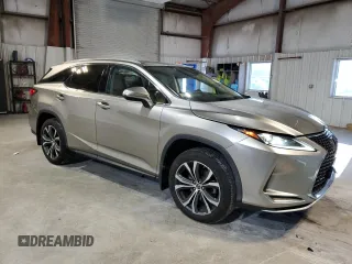 2020 Lexus RX 350L with VIN JTJHZKFA7L2024953, listed as a Copart auction lot 85044234 with 60,874 mi miles and Salvage title. Bid and sale history available at DreamBid. Image 4.