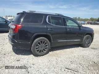 2023 GMC Acadia Denali z VIN 1GKKNXL41PZ145303, wystawiony jako Copart lot #69679514 z przebiegiem 9 099 mil mil oraz Szkoda całkowita • Salvage title. Historia ofert i sprzedaży dostępna na DreamBid. Obrazek 3.