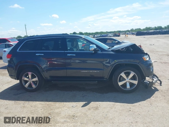 2015 Jeep Grand Cherokee High Altitude with VIN 1C4RJFCG5FC807394, listed as a IAAI auction lot 42452034 with 72,011 mi miles and . Bid and sale history available at DreamBid. Image 14.