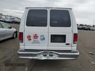2003 Ford Econoline Passenger XL with VIN 1FBSS31S03HA36687, listed as a Copart auction lot 66855044 with 239,504 mi miles and Salvage Title. Bid and sale history available at DreamBid. Image 6.